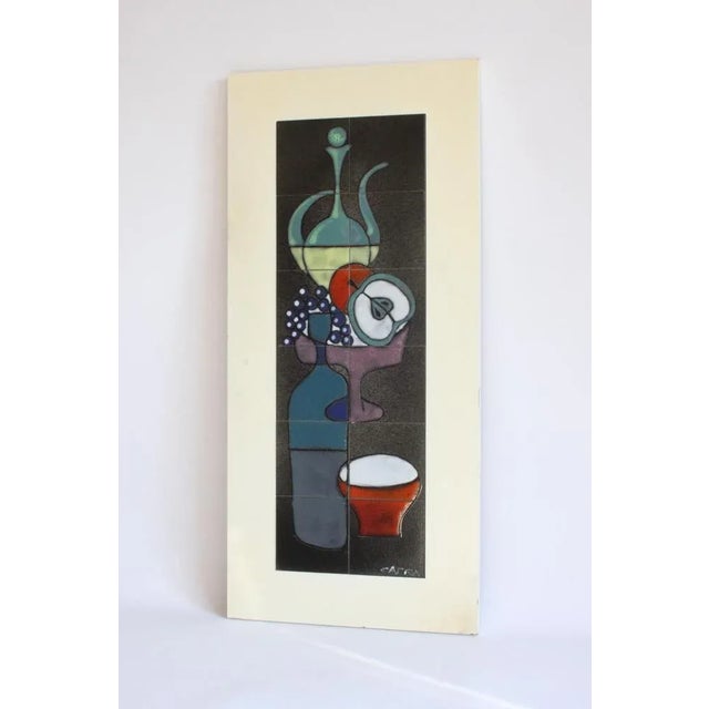 A tall ceramic tile tableau or wall plaque by Capra Italy, 1960s. Depicting an abstract still-life. Modernistic...