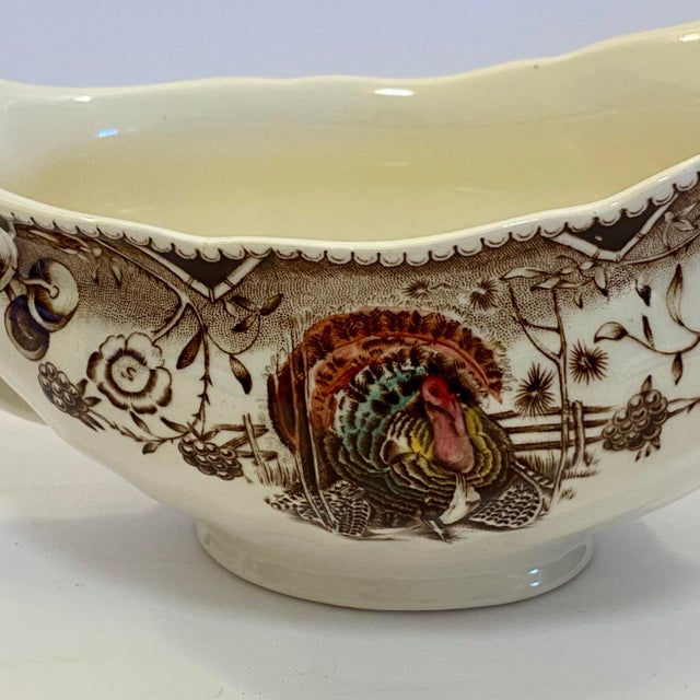 Beautiful vintage gravy boat in Johnson Bros eternally-popular ‘His Majesty’ pattern. Features a newer brown back stamp...