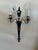 Silver plated cast metal candelabras. Details: Cast metal, silver plated electric wall sconces. These take standard...