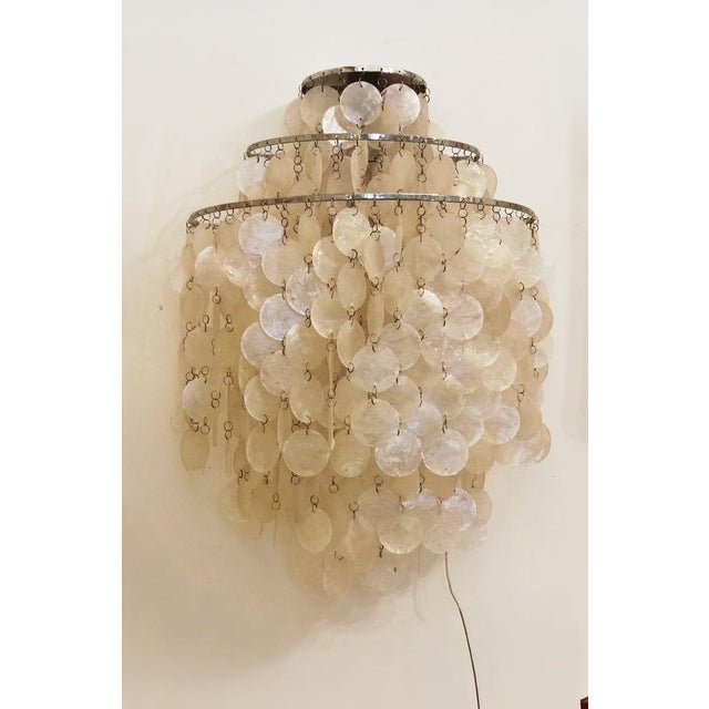 Fun 1wm wall lamp designed by the famous designer verner panton in the 1960s the polished chrome structure of the fun 1wm...