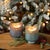 Transform your space with the Red Currant Scented Soy Candle. This set of two candles features a beautiful frosted glass...