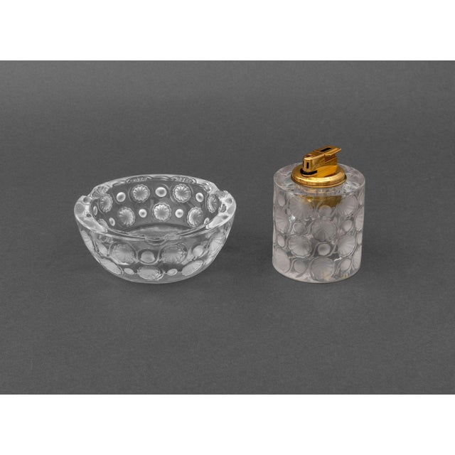 Lalique Crystal "Toyko" Pattern Smoking Set, comprising: ashtray and lighter with gilt metal hardware, each marked...