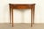 A gorgeous Federal or Hepplewhite style flip-top console or game table By Baker Furniture USA, Circa 1980s Mahogany, with...