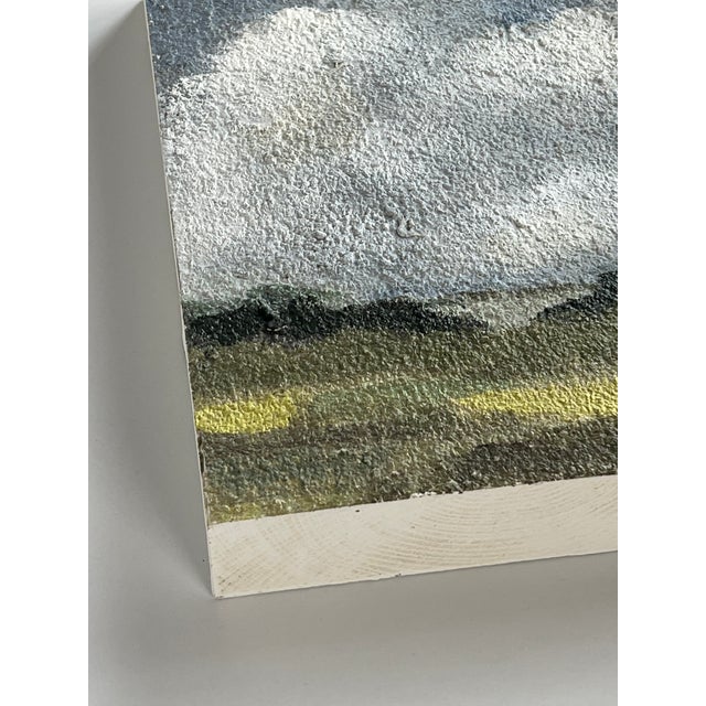 A beautiful pair of landscape paintings on blocks of wood. The sides are painted white. Add these to you gallery wall or...