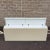 A late 20th century Postmodern 82" divided waterfall storage footboard or blanket chest in cream colored laminate with...