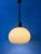 Vintage space age mushroom pendant lamp in beige colour. The acrylic glass shade produces a magnificent glow. The height...