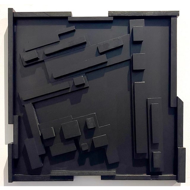 A striking Brutalist-inspired wall sculpture, created in our studio and composed of layered geometric forms in a...