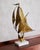 A truly stunning mid century sailboat sculpture. This piece was found with a painted wooden base and replaced with a...