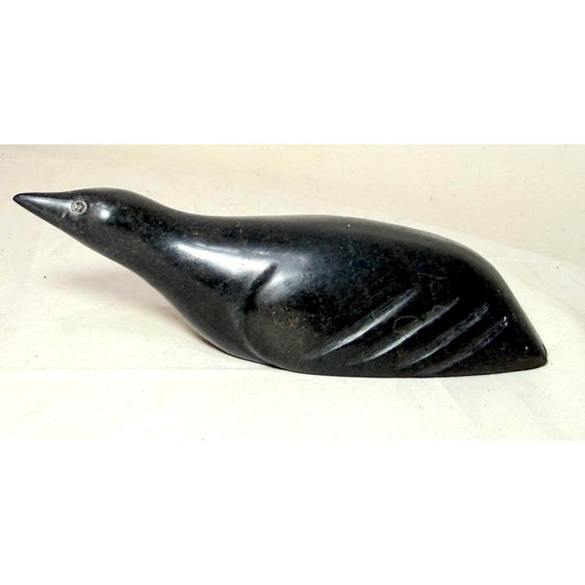 Up for sale is a nice quality antique hand carved Canadian soapstone Eskimo sculpture. It's completely sculpted by hand...