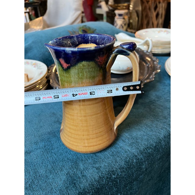Vintage Hand Made Yellow Pottery Pitcher With Blue and Green Accents For Sale - Image 4 of 4