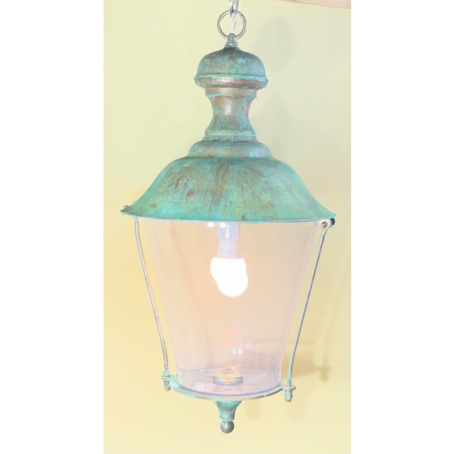Add timeless charm to your home or garden with this beautiful, heavy-duty hanging lantern. Crafted from solid brass, this...