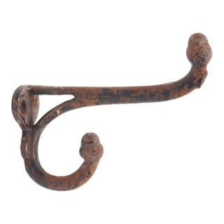 Vintage Distressed Cast Iron Double Arm Acorn Wall Hook For Sale