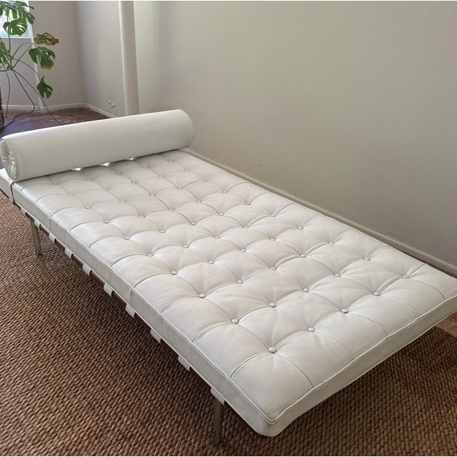 Vintage Barcelona daybed in the style of Ludwig Mies van der Rohe. White tufted leather with wood frame and metal legs....