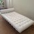 Vintage Barcelona daybed in the style of Ludwig Mies van der Rohe. White tufted leather with wood frame and metal legs....