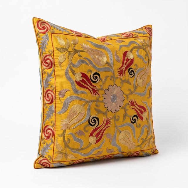 This beautiful hand embroidered suzani fabric is sourced from Uzbekistan. We cut and sew the pillow by hand in our Houston...