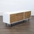 Wood and lacquer mid-century style media console. Brand: West Elm. Dimensions (in): 70W x 20D x 24H.