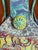 Tall Ceramic Pocketbook Ceramic Sculpture was constructed from individually textured and impressed clay sections joined...