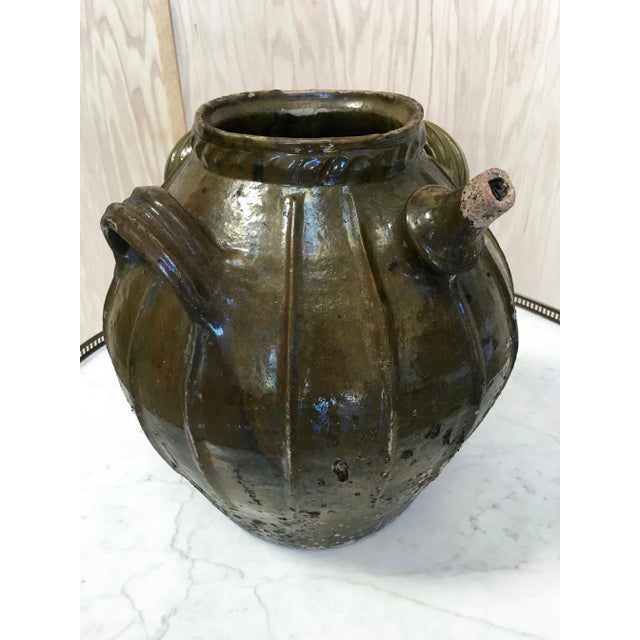 Antique 19th century terracotta oil jug. Great addition for your garden accessories or home decor. Wear is consistent with...