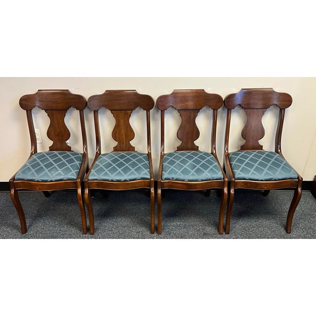 Set of four vintage cherry empire style dining chairs by Pennsylvania House. Nicely shaped yoke crest with a beautiful...