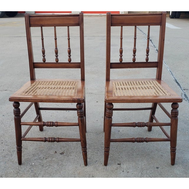 Beautiful set of four Late Victorian walnut inlays cane seat side chairs. Measures 16.5 inches in width, 16. inches in...