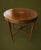 Beautiful antique Edwardian Sheraton Revival mahogany center table dating to approximately 1895–1910. This elegant round...
