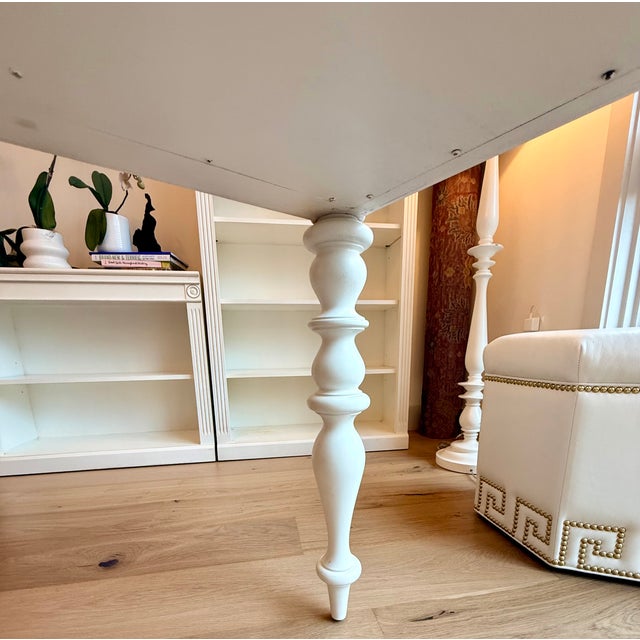 Beautiful Ethan Allen Collector’s Classics writing desk featuring elegant turned legs, three storage drawers, and a softly...