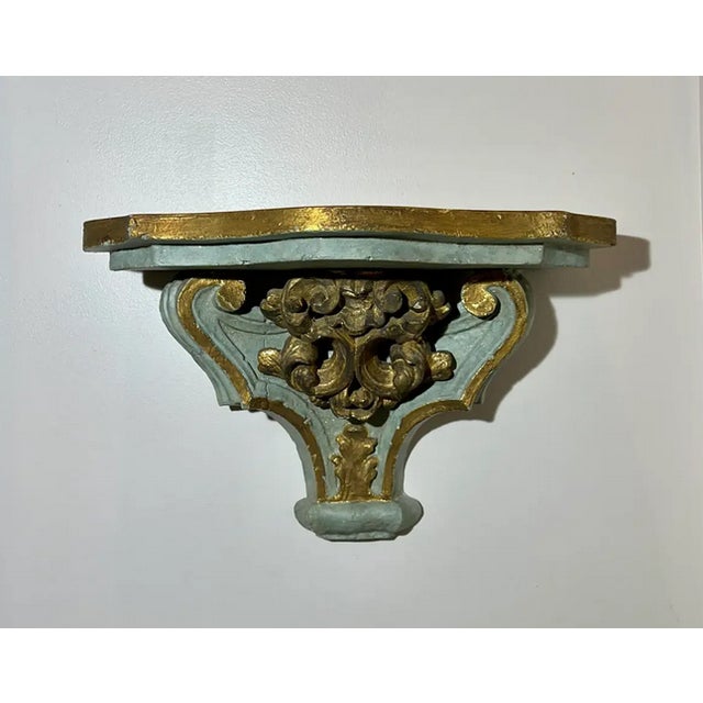 Gorgeous impressive set of wall brackets. The colors are so pretty, a warm gold on a muted celadon or dusty aqua is the...