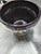 This is a Sun and Moon indoor or outdoor style celestial dip glaze green and brown finish pot. The maker is Robinson...