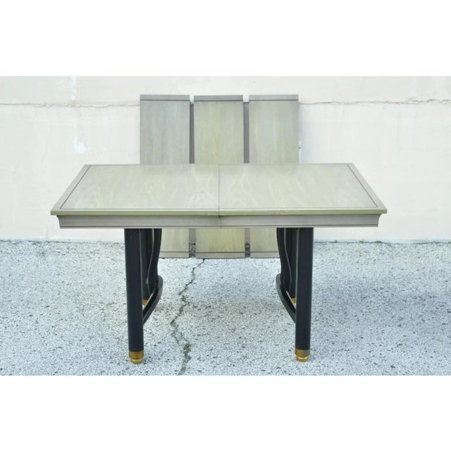 Vintage Mid Century Modern Black Lacquer James Mont Style Dining Table by Blowing Rock. Item features (3) 12" leaves,...