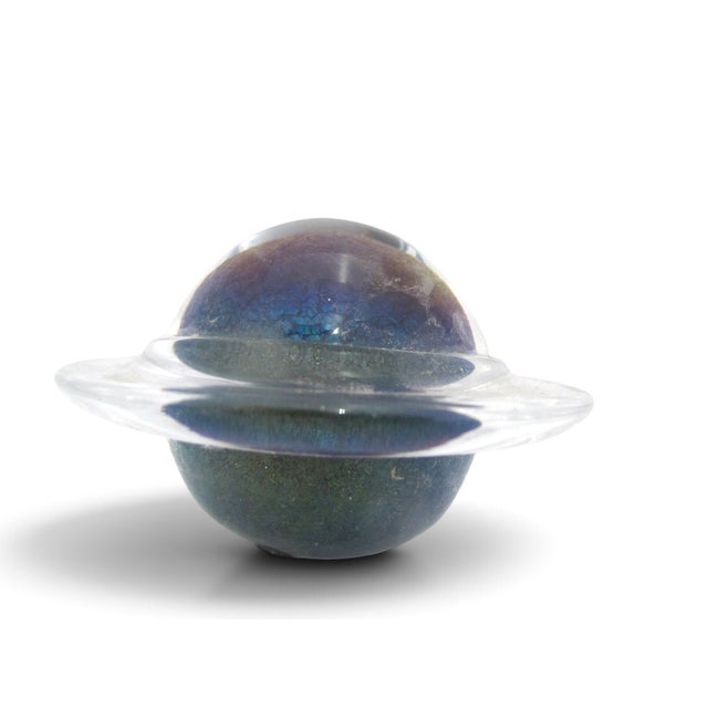 Vintage 1993 Sci Fi Channel Planet Saturn galaxy paperweight. Clear glass ring wrapped around an iridescent, metallic blue...