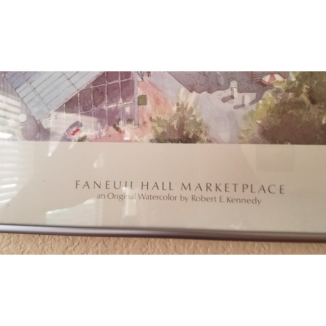 Robert e. Kennedy pencil signed print of Faneuil Hall Market. Framed in a brushed chrome metal frame w/ 3 inch white...