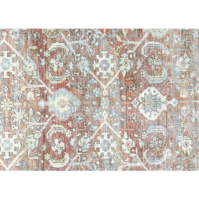 1940s Persian Mahal Rug. Hand woven in the Mahal region of Iran. Distressed and refinished in the U.S. These intricately...
