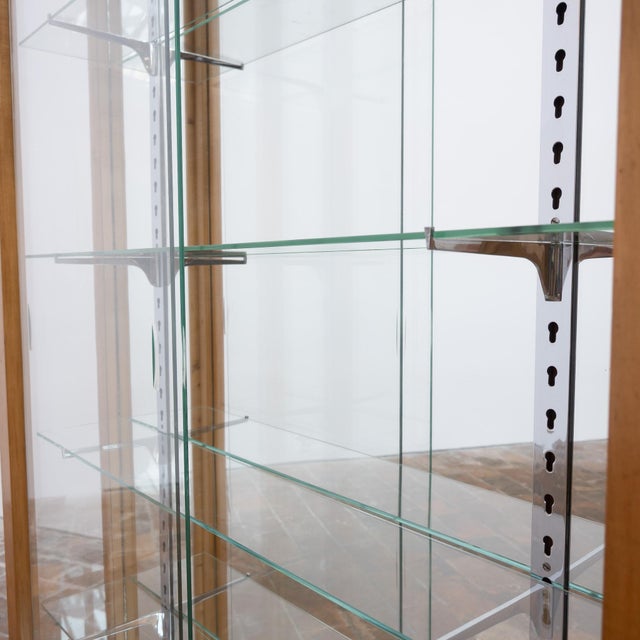 Light Walnut Display Cabinet with Sliding Glass Doors – 20th Century An elegant display cabinet crafted from light walnut....