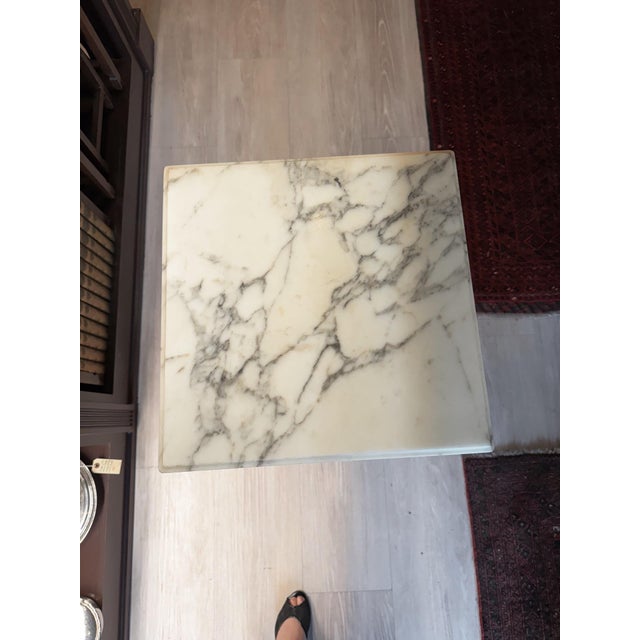 A beautifully proportioned late 19th century French Louis XVI style walnut nightstand, crafted circa 1890 and showcasing...