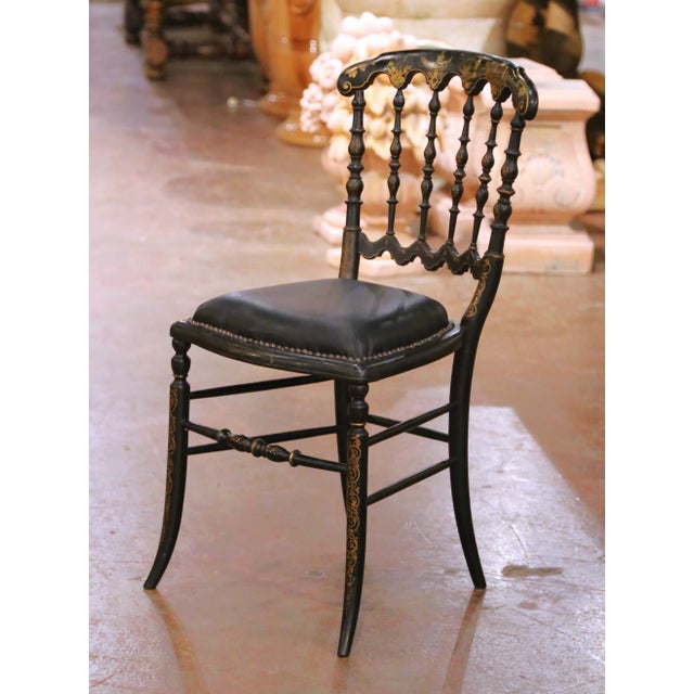 This elegant antique French side chair was crafted in the Napoleon III style, circa 1880. Executed in finely turned wood...