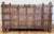 Monumental antique Anglo-Indian Damchiya, or dowry chest. Stunning carved Burmese teak with hand forged iron strap work,...