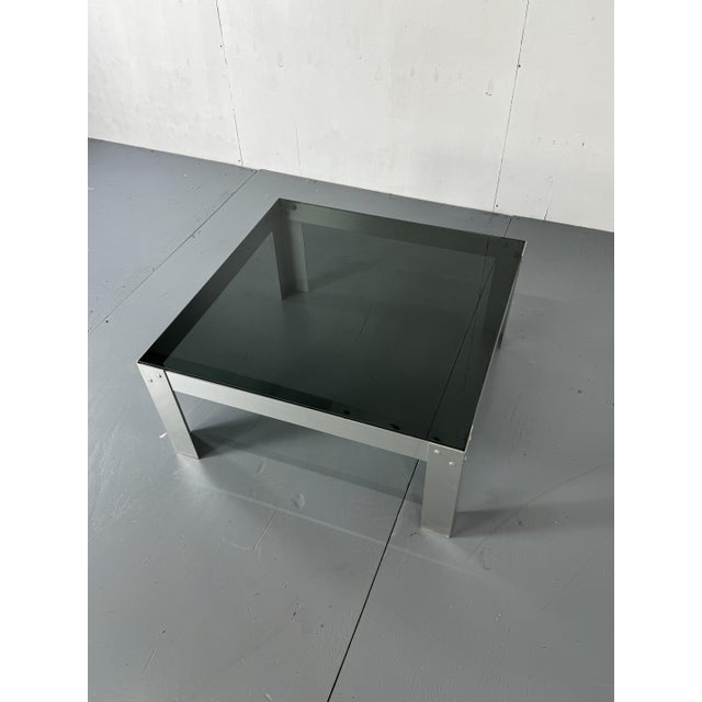 Nice Modernist Aluminum and grey Glass coffee table. Minimal beautiful design.