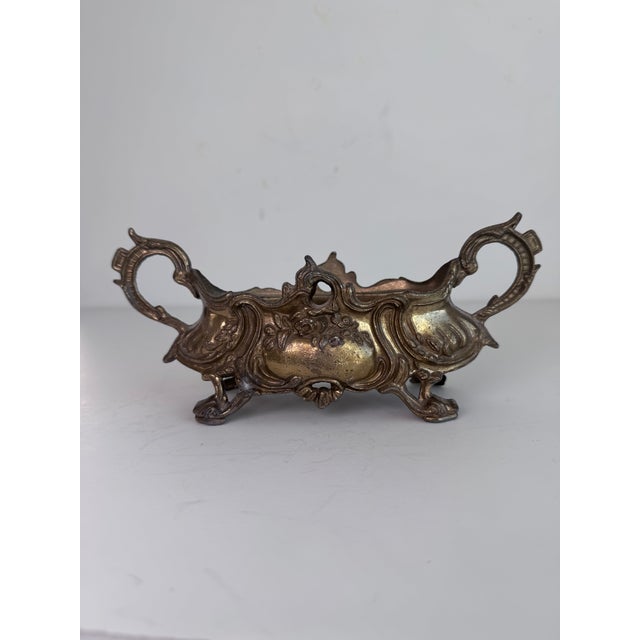 An old world elegant style jardiniere. The smaller size can be fitted with succulents or small orchids along with your...