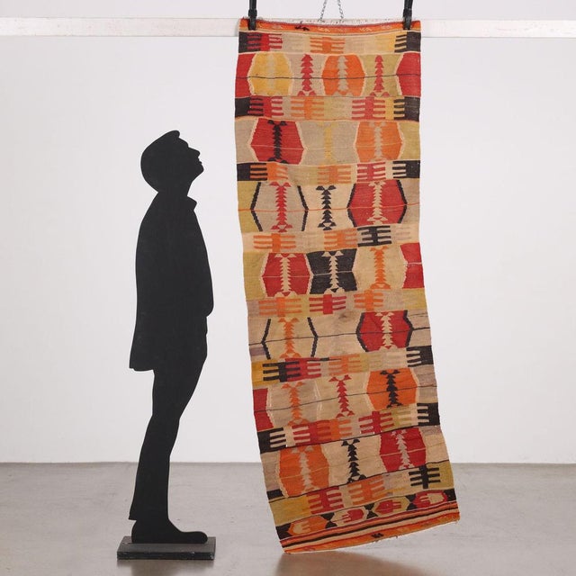 Wool Kilim carpet, fine knot, manual production. This piece is attributed to the mentioned designer/maker. It has no...