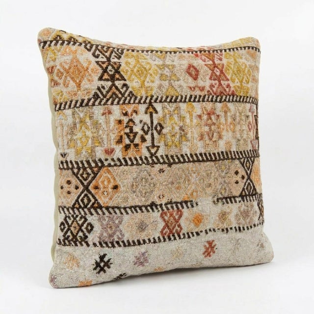 This beautiful 15'' x 16'' hand-woven Kilim pillow cover was made from an authentic Turkish kilim. The traditional flat-...