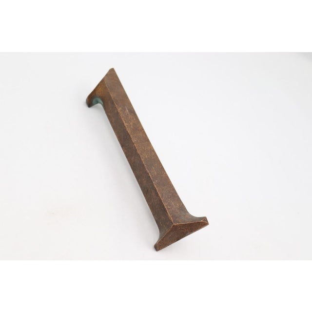 Reclaimed bold serif font design number 1 house number with two prongs 5.5 in apart on the back. Good condition with...