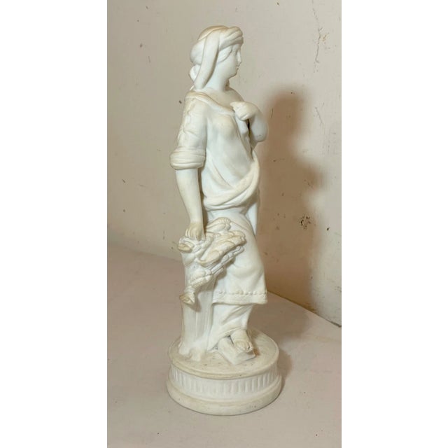 Up for sale is a nice quality antique 19th century figural parian statue. It's done with exquisite realistic detailing...