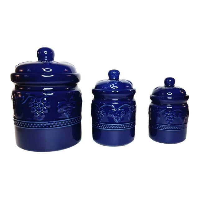 Set of Three (3) Vintage Cobalt Blue Ceramic Canisters Raised Fruit Grape Design For Sale