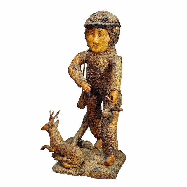 Rustic Black Forest Root Wood Hunter ca. 1920 A rustic wooden hunter statue with deer. carved out of a piece of root wood....