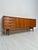 Beautiful and spacious vintage Mid-Century teak sideboard, an original piece from the 1960s. This timeless design embodies...