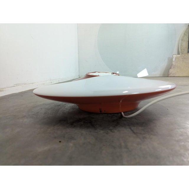 Wall Light by Patrick Jouin for Artemide, 1970s, in Very Good conditions. Designed 1970 to 1979 European Plug (up to...