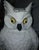 70s Hollywood Regency style ceramic owl with high-gloss white glaze, contrasting, vibrant yellow hand-painted eyes, black...