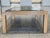 A late 20th Century square coffee table with an oak wood frame and steel plate inset top. The overall design can be...