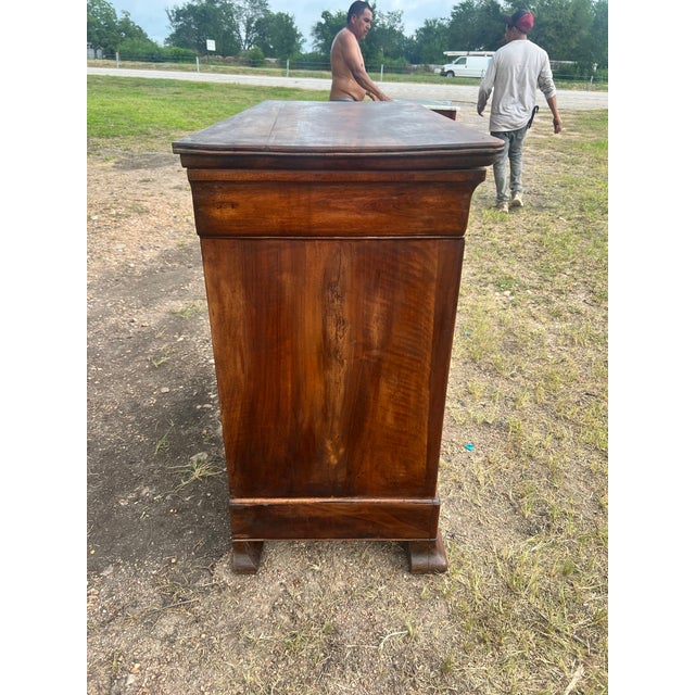Elegant 19th-century Louis Philippe commode, crafted in richly figured walnut with a warm, lustrous patina. This classic...