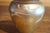 A beautiful hand-blown art glass vase from Robert Held. In very good condition. Measures 4.75 inches tall x 4.25 inches.